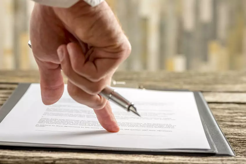 Family meeting with legal advisor, showing when a Will is crucial—highlighting Trusted Will Writing Northamptonshire for essential life planning.